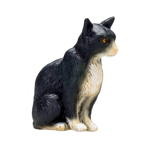 Mojo gato sentado en tierras de cultivo blanco y negro - 387371
