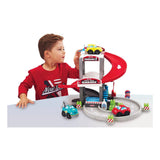 Garaje ecoiffier en abrick con transportador y coches.