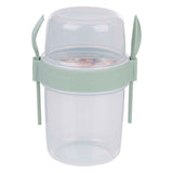 Vaso para guardar alimentos con cubiertos.