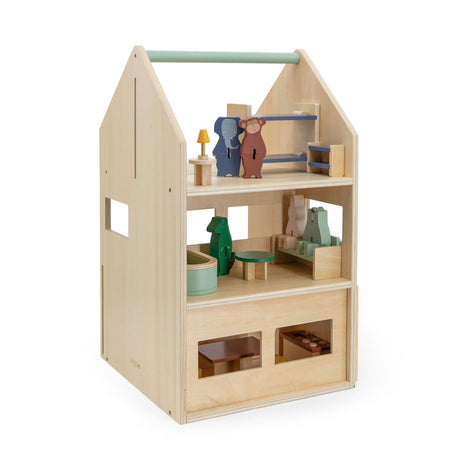 Casa de muñecas Trixie de madera con accesorios.