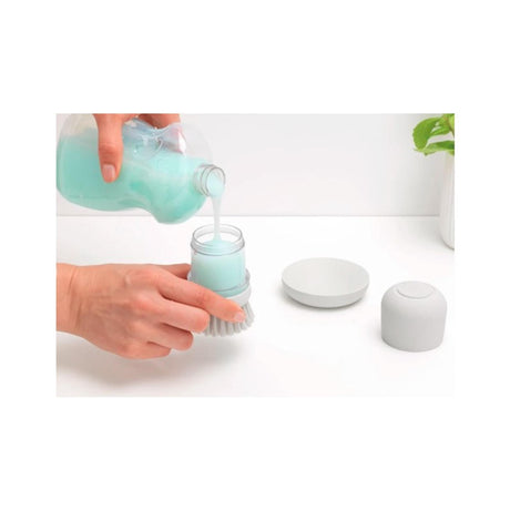 Brabantia cepillo lavavajillas lateral para fregadero con depósito de jabón gris claro