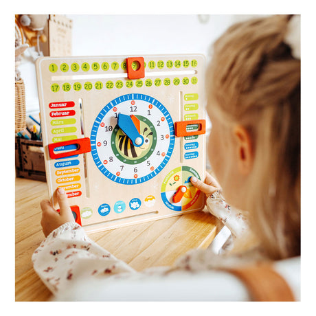 Small foot - Reloj calendario de madera con estaciones en (alemán)
