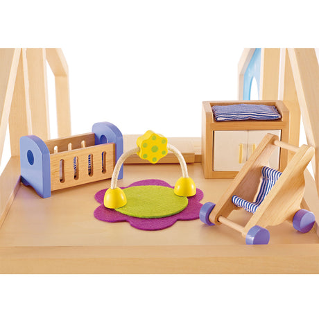 Habitación para bebé en casa de muñecas Hape.