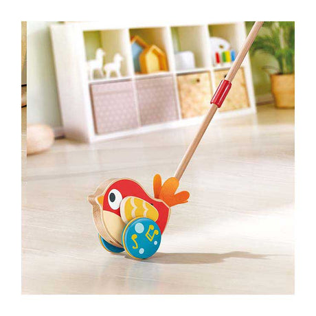 Palo de empuje de madera con sonido Hape Lilly Bird