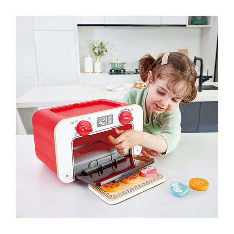 Horno de juguete Hape con galletas mágicas - Juego de horno para hornear que cambia de color, a partir de 3 años