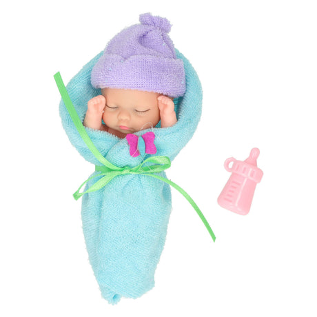 Mini muñeca envuelta en tela