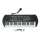 Teclado electrónico con micrófono.