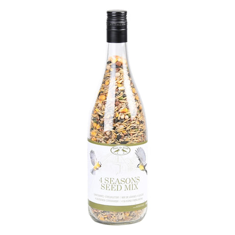 Botella de vino de diseño Esschert con comida espolvoreada.