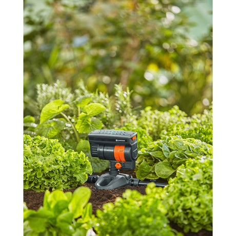 Aspersor oscilante con sistema de microgoteo Gardena os 90 (naranja gris oscuro)