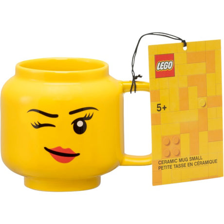 Taza de cerámica Lego Room Copenhague - cabeza de niña guiñando un ojo, pequeña (amarillo)