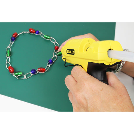 Pistola de pegamento rápido Stanley 6-gr50 (amarillo negro)