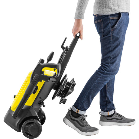 Limpiadora de alta presión Kärcher k 4 wcm premium (amarillo negro, con limpiador de suciedad y enrollador de manguera)