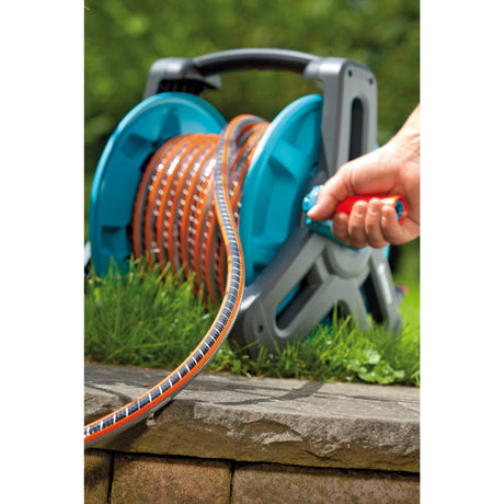 Manguera flexible Comfort Gardena de 13 mm (1 2 ) (negro naranja, 18036-20, 30 m)